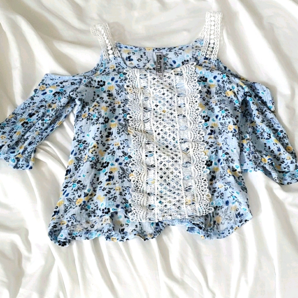 floral, 3/4 length sleve, with open shoulders.